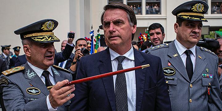 Far-right presidential candidate Jair Bolsonaro speaks with Brazilian generals
