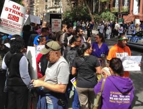 Striking nursing home workers are joined in a picket by NYC student activists